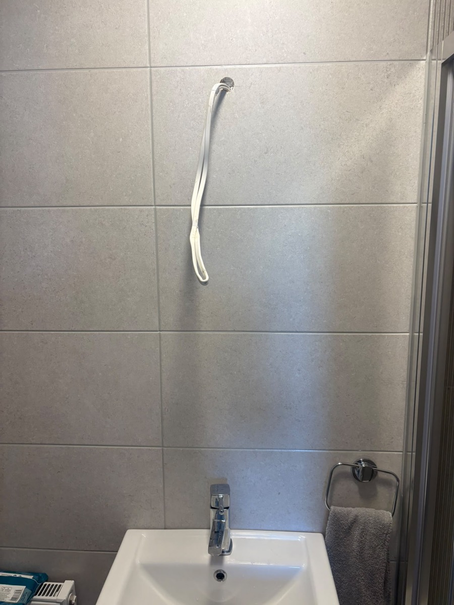 Illuminated bathroom mirror installation, Cork, before